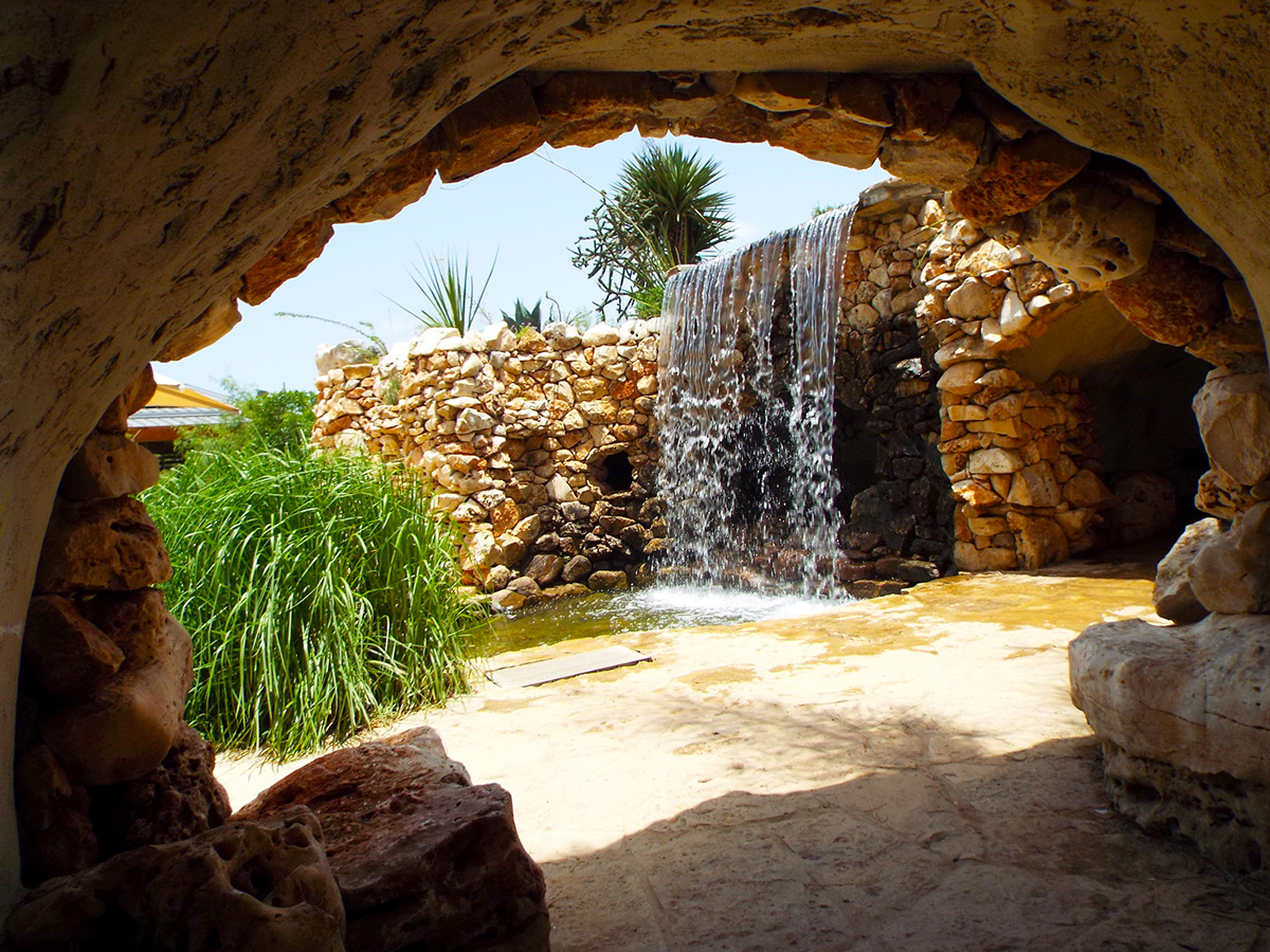 Steven-Chamblee-exit-from-limestone-cave-WEB